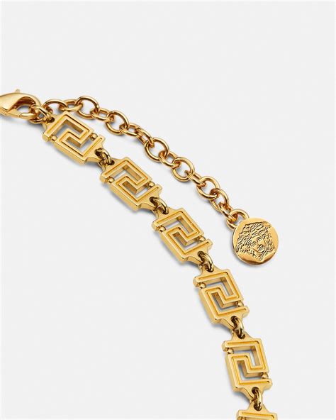 ciondolo lettera m oro versace|Collana Medusa Greca Oro .